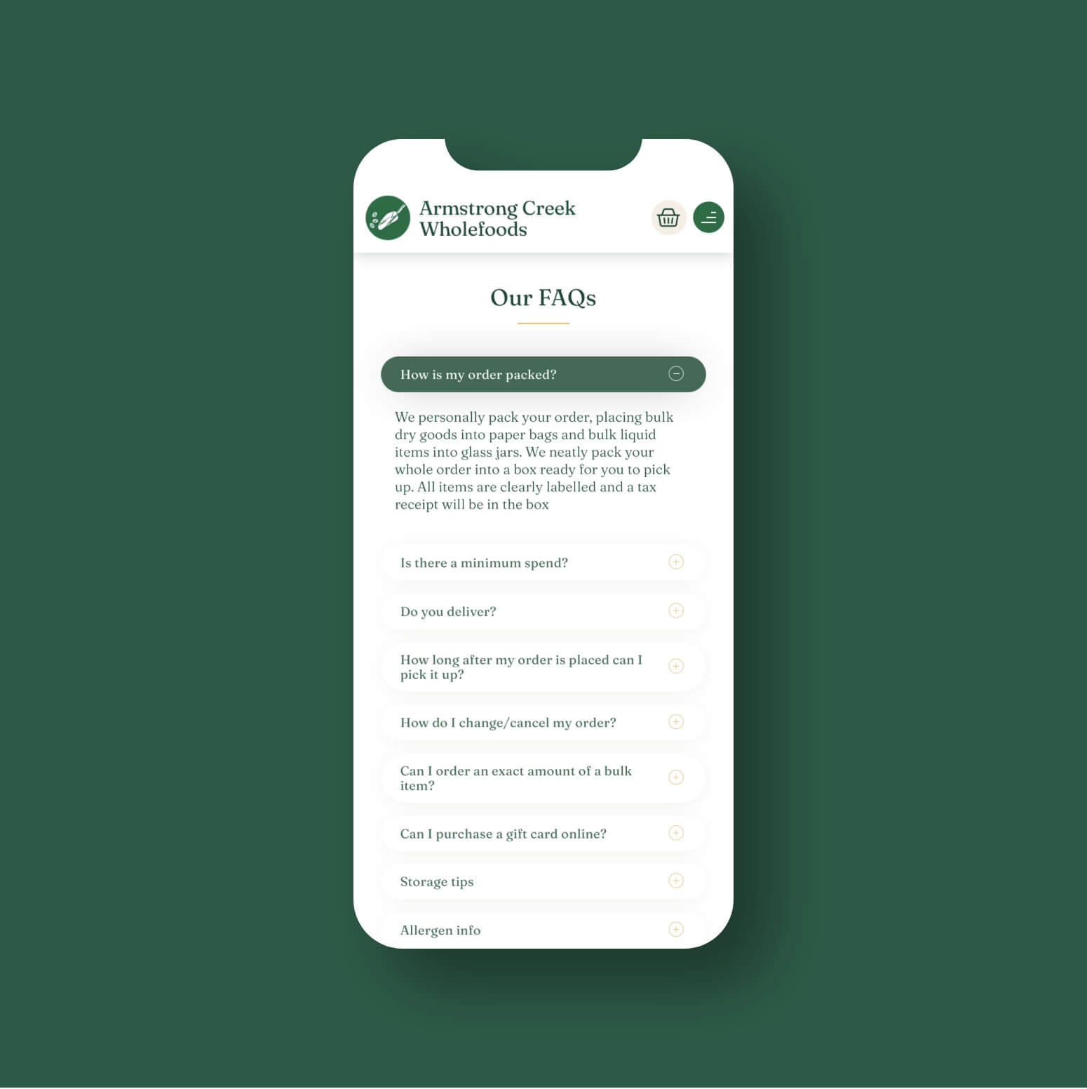 Armstrong Creek Wholefoods website preview on a mobile phone shaped cutout, over a green background