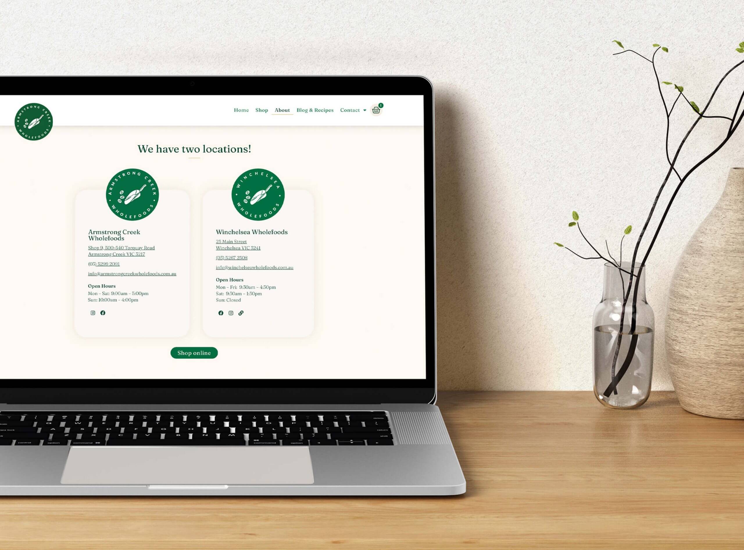 Armstrong Creek Wholefoods website preview on a computer which is sitting on a desk